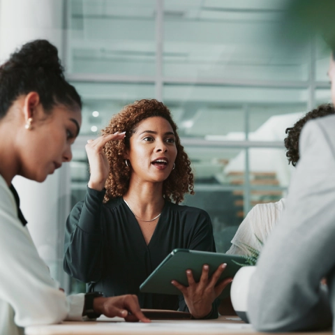 Woman speaking during a meeting.